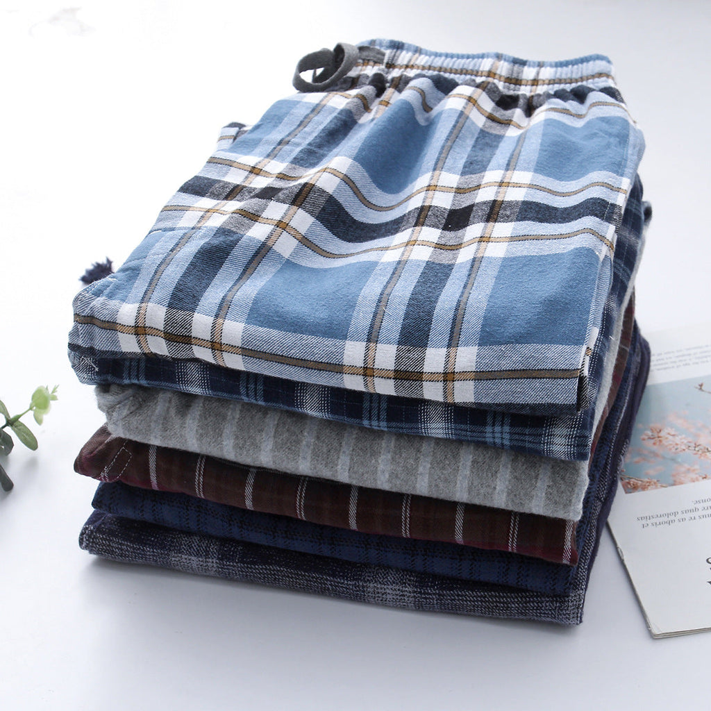 Folded men's pajama pants, blue plaid flannel with elastic waistband