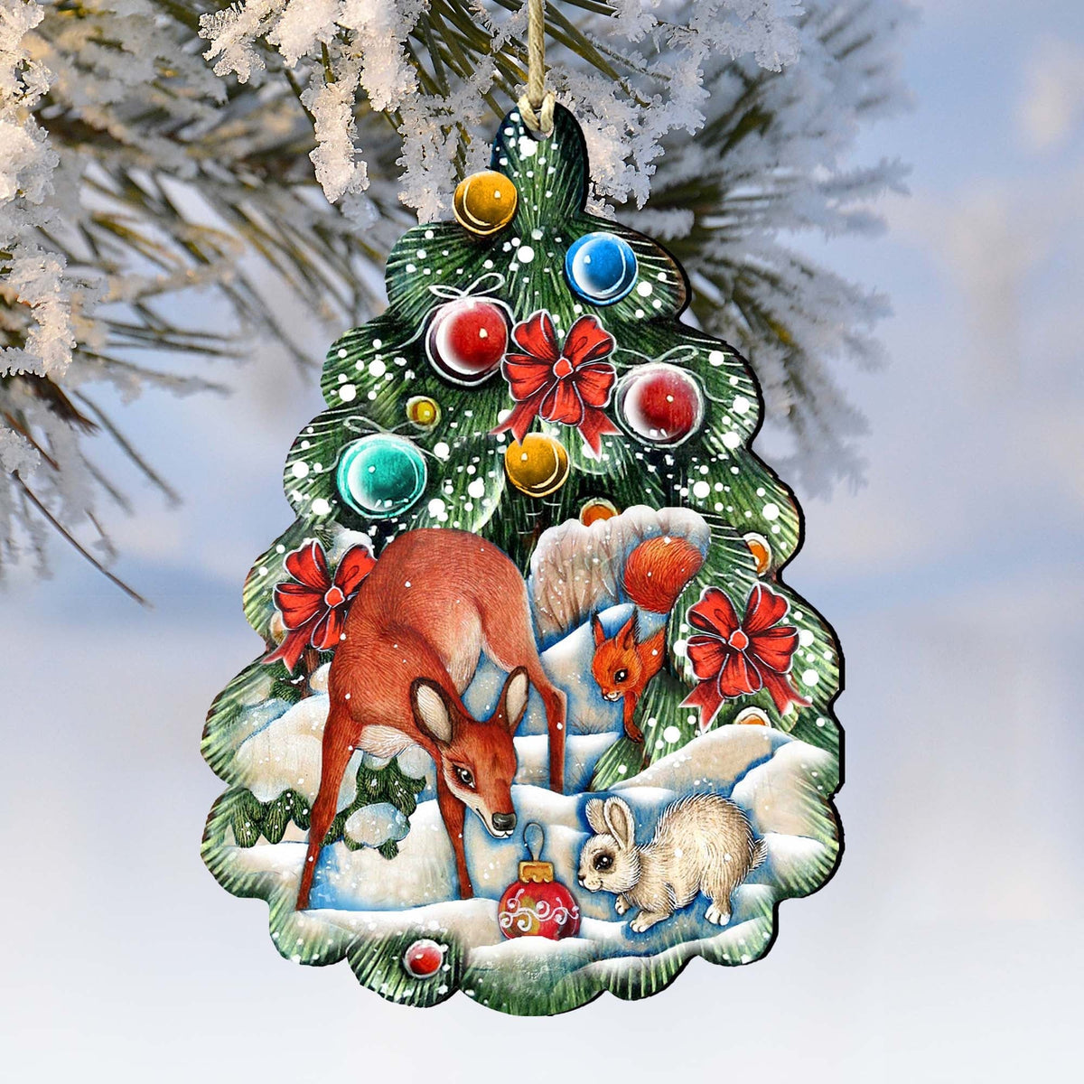 Hanging wooden Christmas tree ornament with green border, forest animals, and colorful baubles
