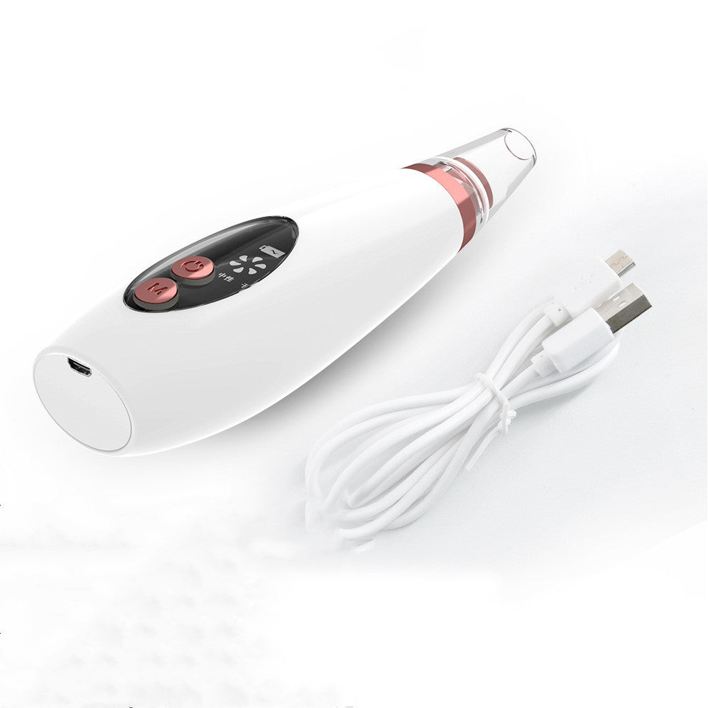 White handheld blackhead remover device with USB cable and clear suction nozzle