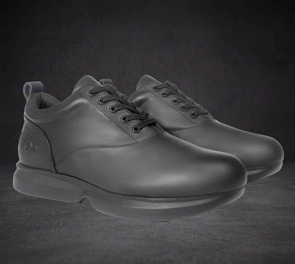 Pair of WOA low-top lace-up sneakers in dark leather with padded collar
