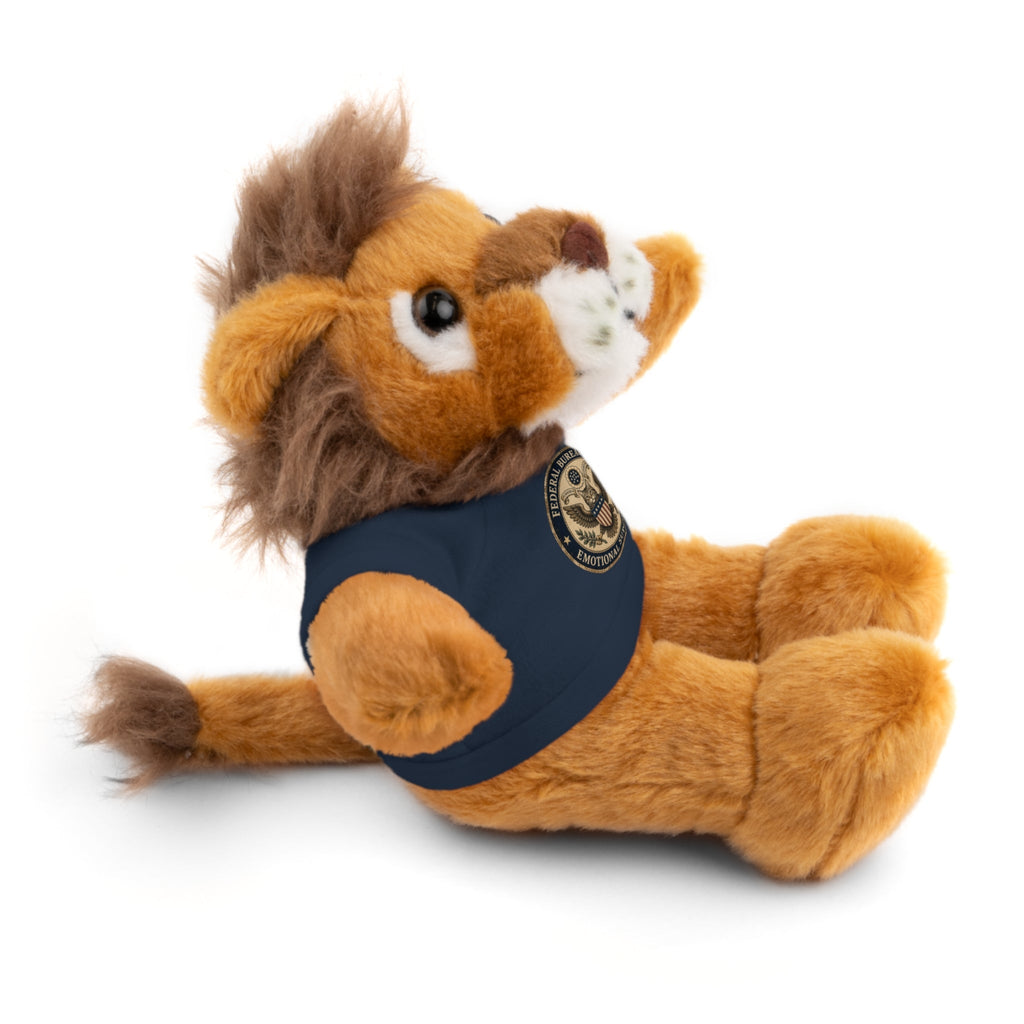 Lion plush cat with navy T-shirt and round emblem, lying with head up
