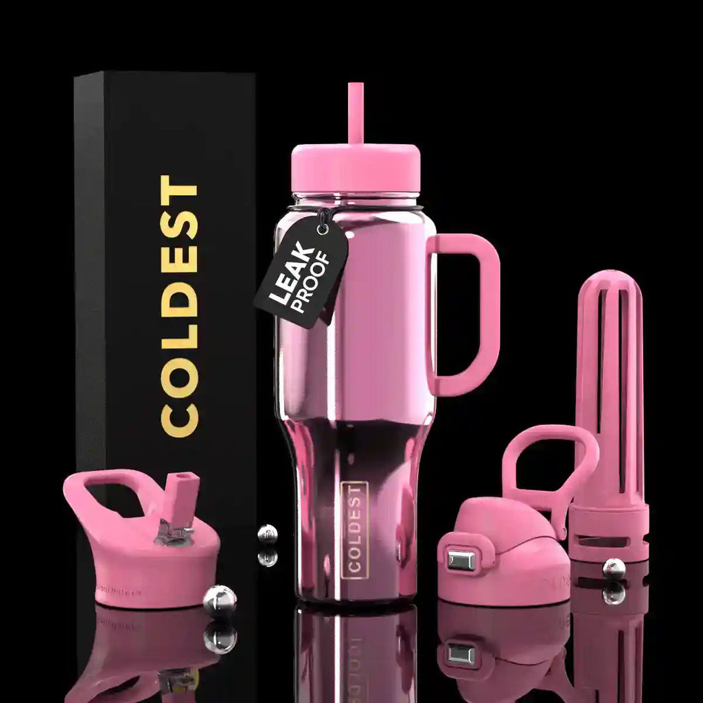 Pink insulated tumbler with mirror finish, handle, straw, and leakproof lid.