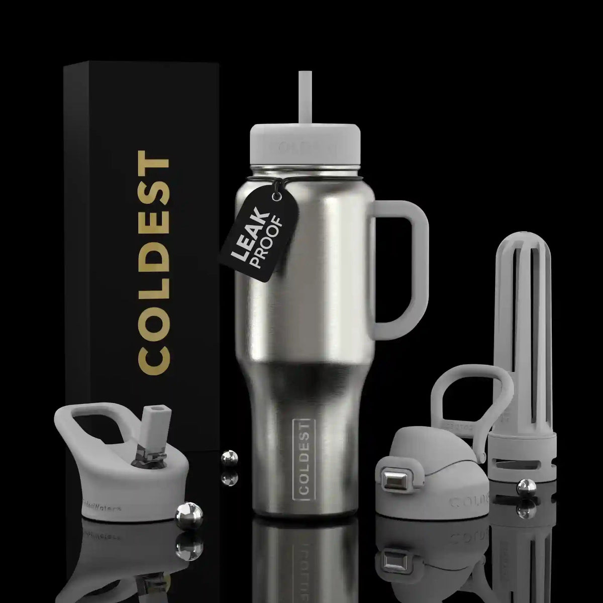 Silver insulated tumbler with handle, straw, and leakproof lid set.