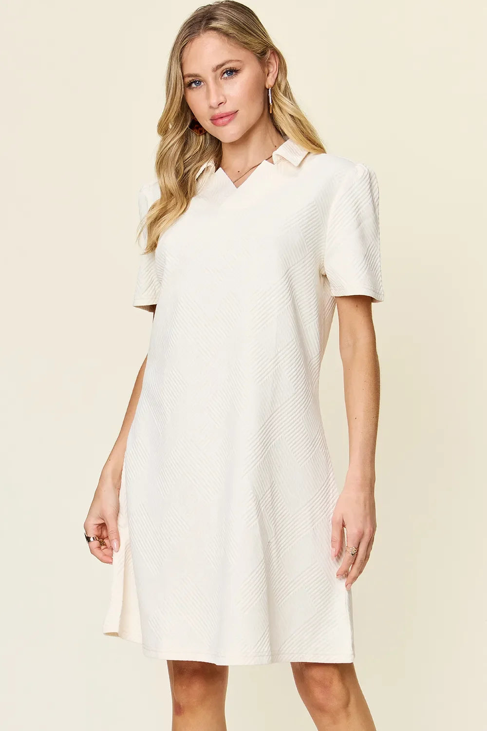 White textured collared short-sleeve shift dress with buttoned placket