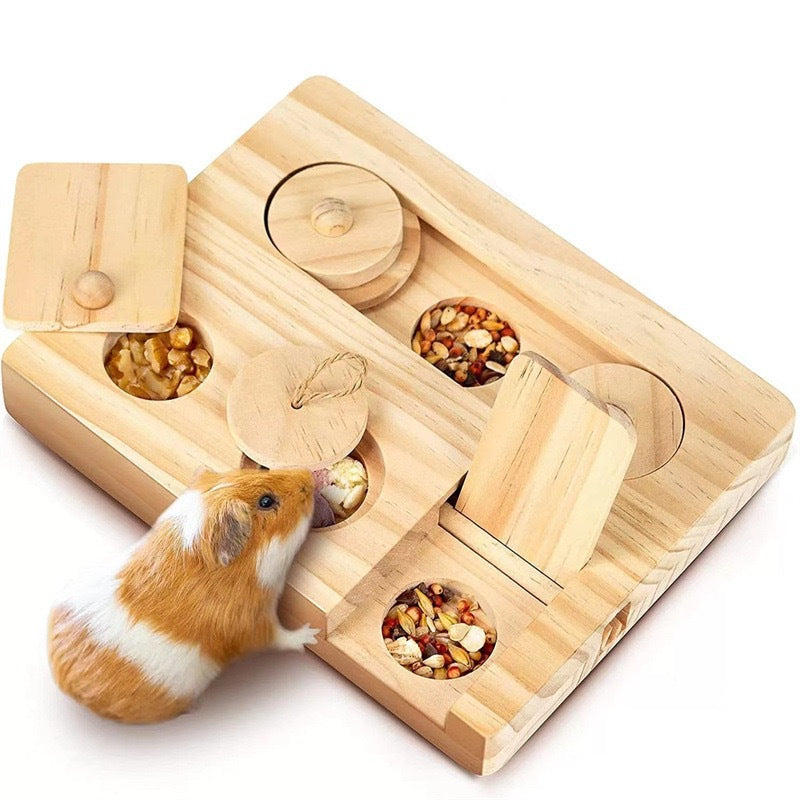 Wooden hamster snack dispenser with round treat wells, rope pegs, and hamster