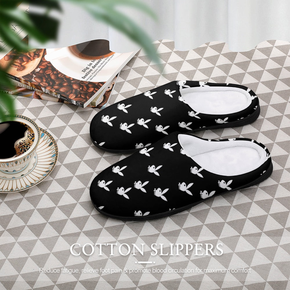 Pair of black cotton slippers with white bunny print, slip-on with light interior
