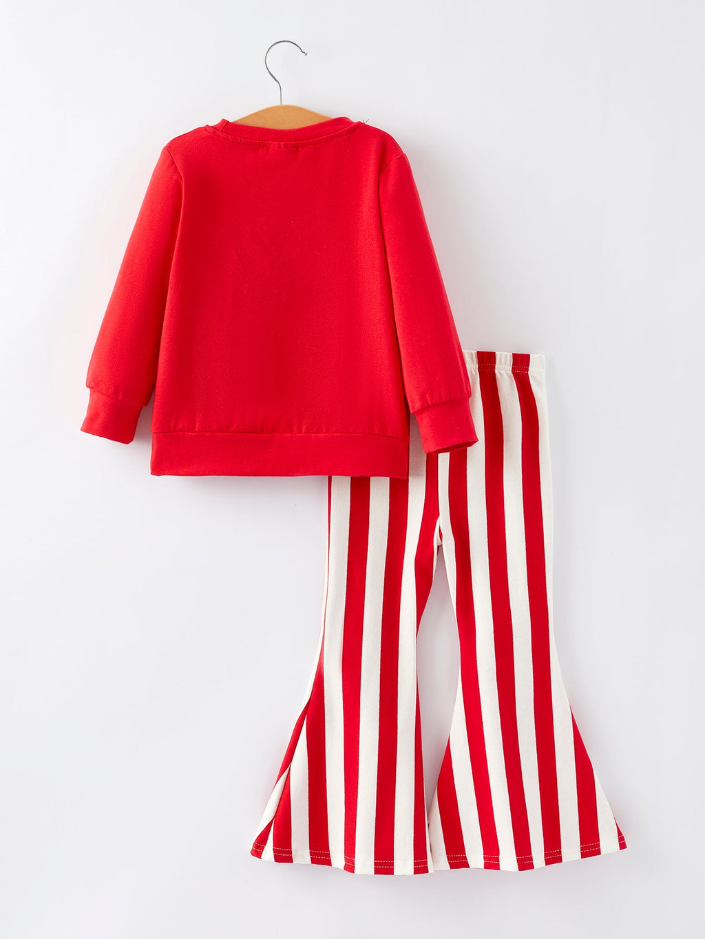 Girls red sweatshirt and red-and-white striped bell-bottom pants, back view