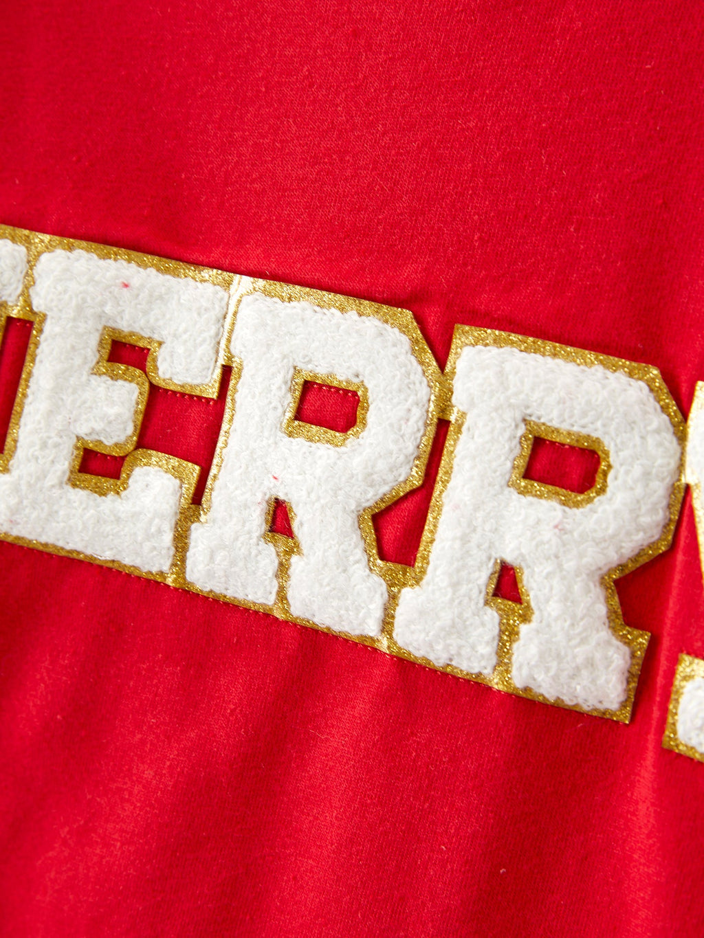 Gold-trim 'MERRY' applique on red girls sweatshirt