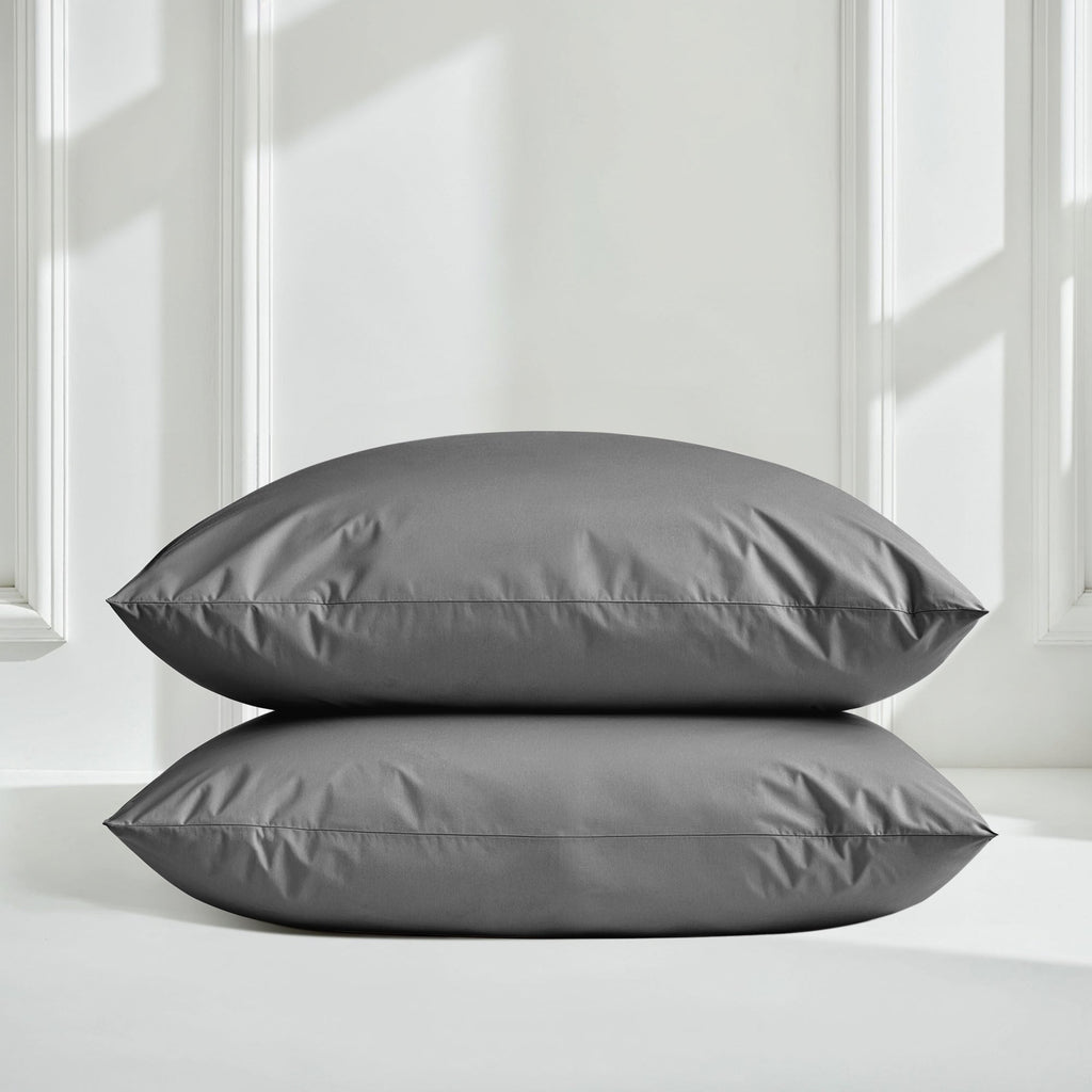 Gray sateen bedding bundle with two smooth envelope pillows.