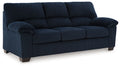 Blue sofa with tufted back cushions, rolled arms, and squared seat panels