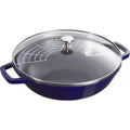Blue enameled cast iron braising pan with glass lid and stainless rack