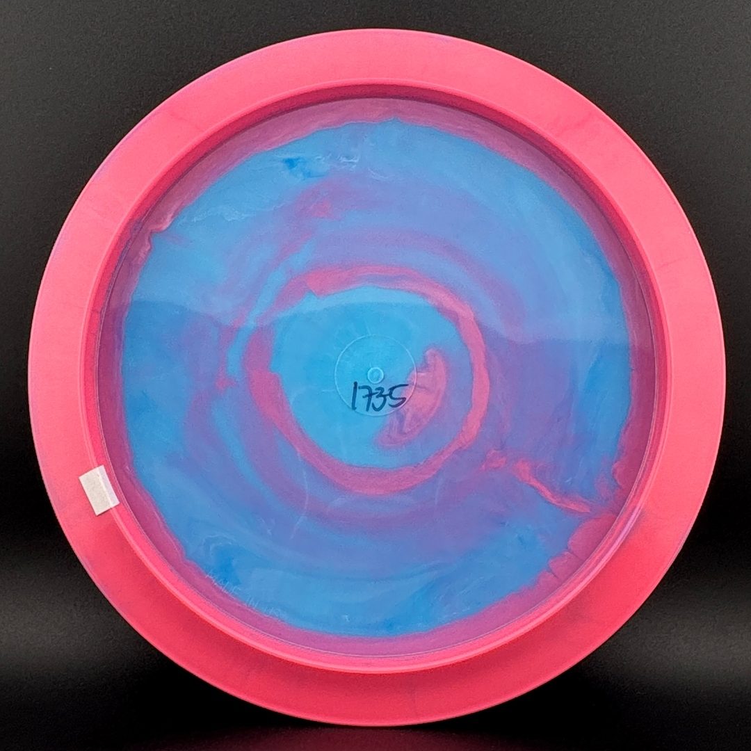 Disc golf driver underside with blue interior and pink rim
