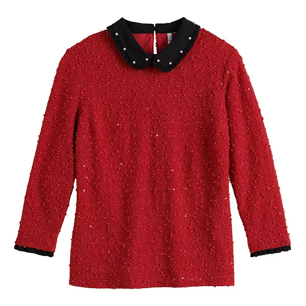Red three-quarter sleeve blouse with black collared neckline and V cutout.
