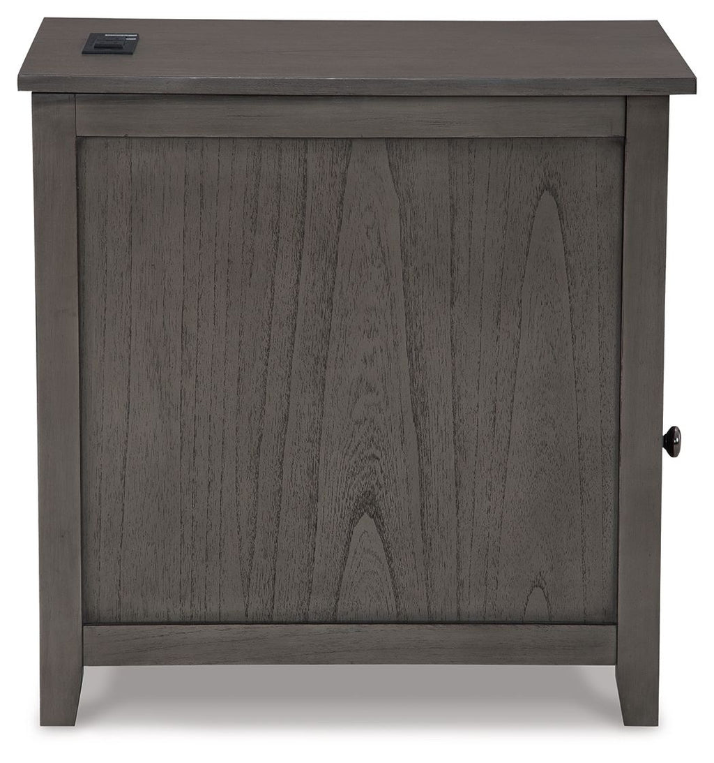 Chair side end table in dark gray wood with front cabinet panel and side door knob