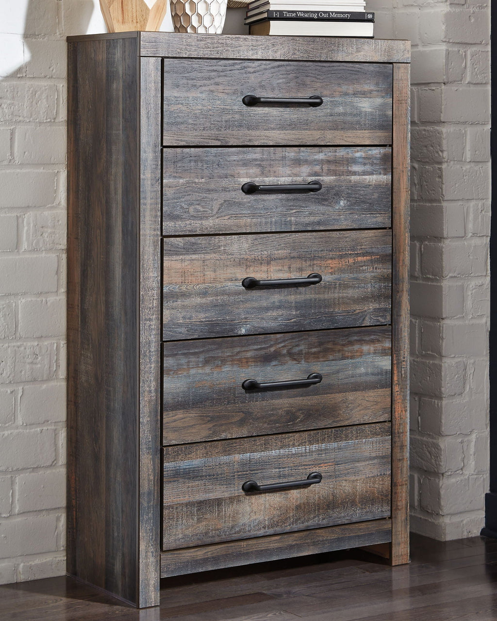 Wooden chest of drawers in gray-brown with black bar pulls, vertical stack