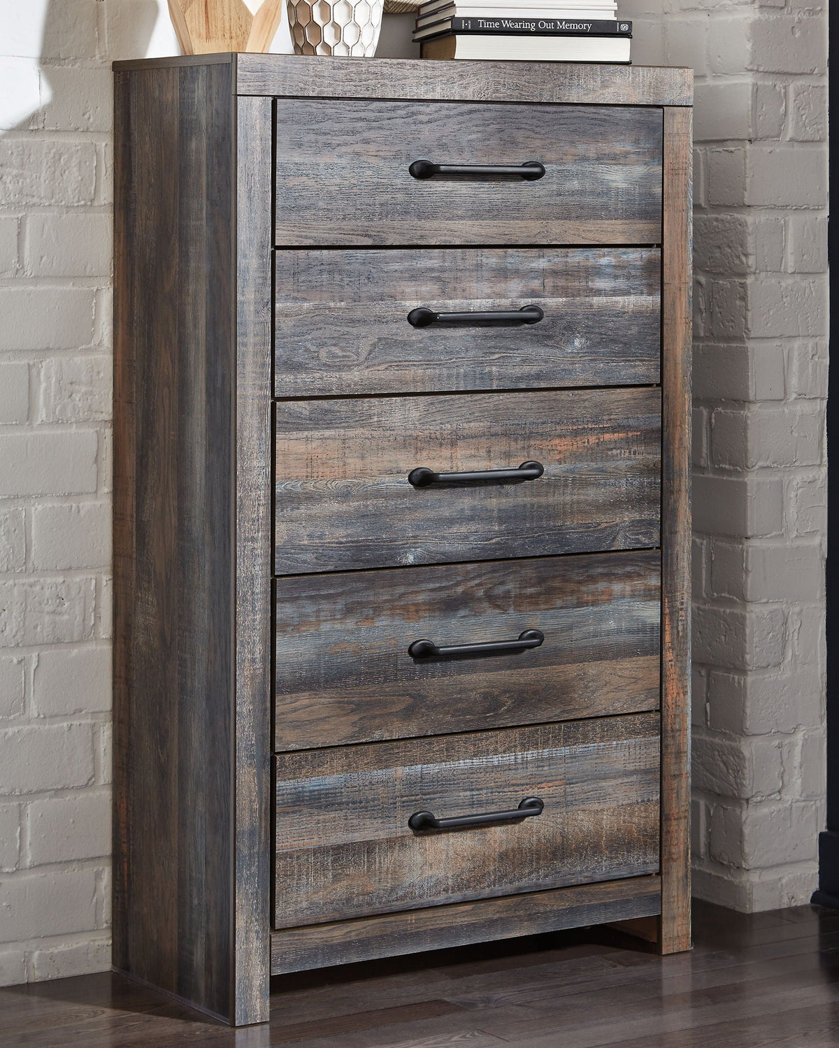 Wooden chest of drawers in gray-brown with black bar pulls, vertical stack