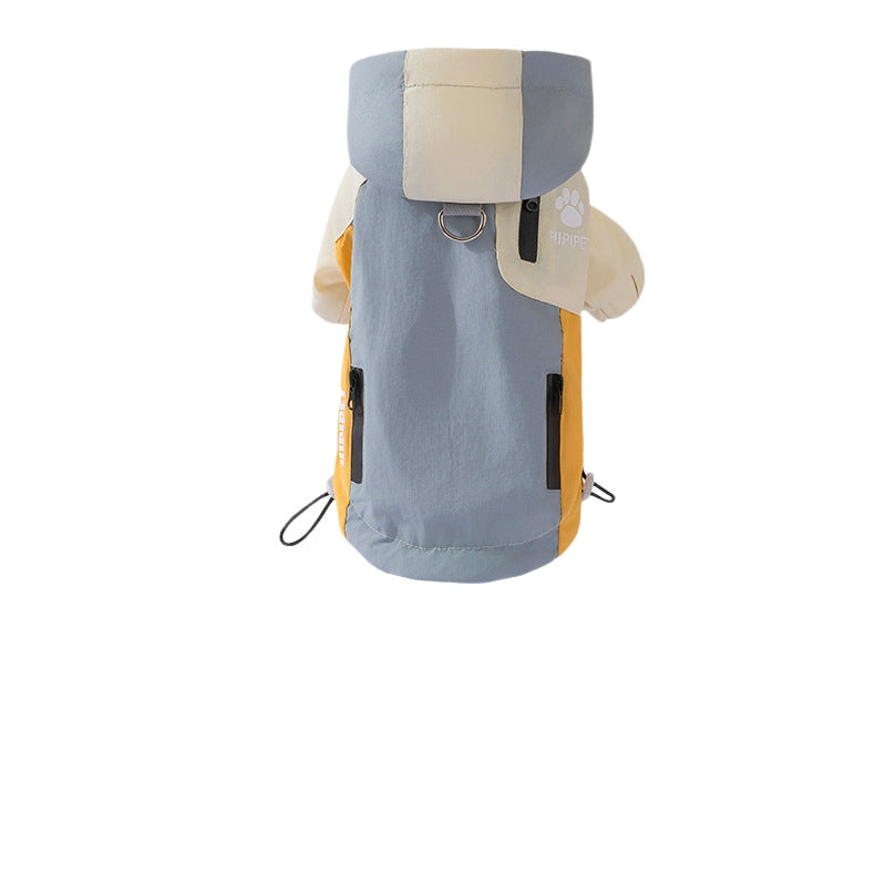 Light blue waterproof dog outdoor jacket with hood, leash ring, and side pockets