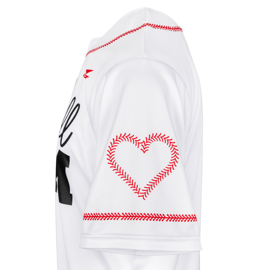 White baseball jersey side view with red heart graphic and baseball-style stitching