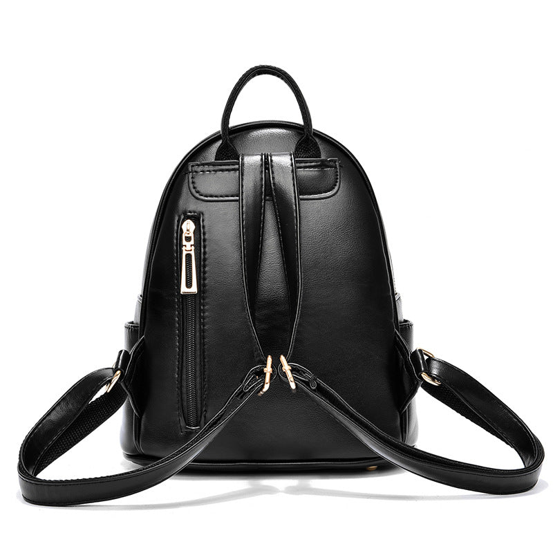 Black PU leather backpack with top handle, adjustable shoulder straps, and side zipper pocket.