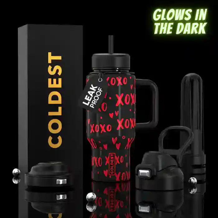 Black 24oz insulated water bottle with red XOXO hearts pattern, straw lid, and handle