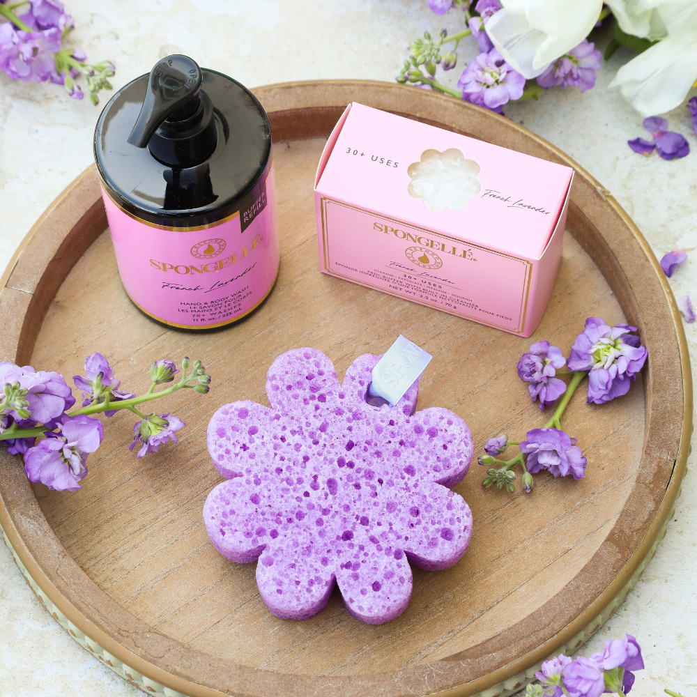 Lavender buffer sponge, pink body wash refill bottle with pump, and boxed set