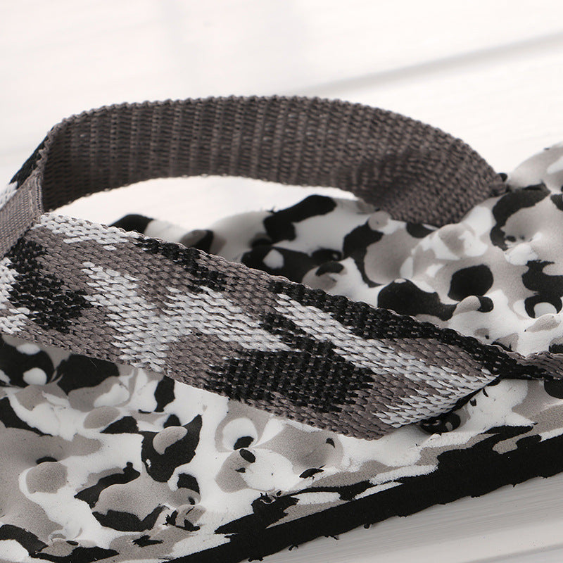 Women's camo platform flip-flop sandal with thong strap and cushioned footbed