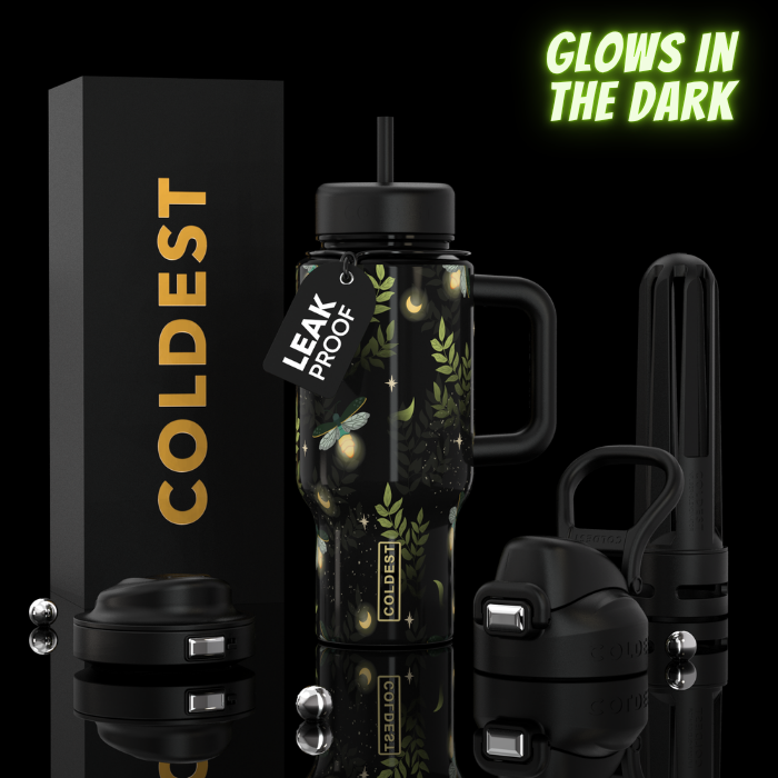 24oz black tumbler with handle, straw, and glowing botanical print; black lid and cap