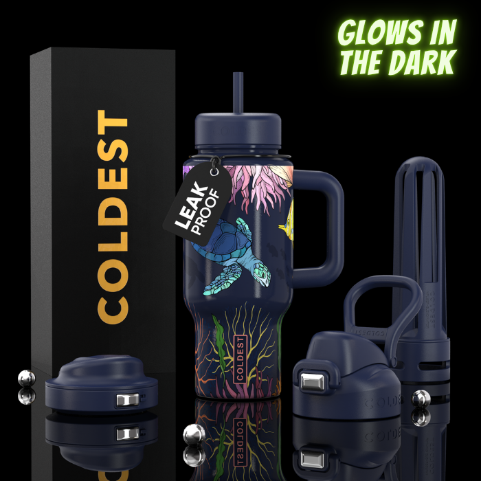 Dark blue 24oz insulated tumbler with glow graphic, straw lid, carry handle.