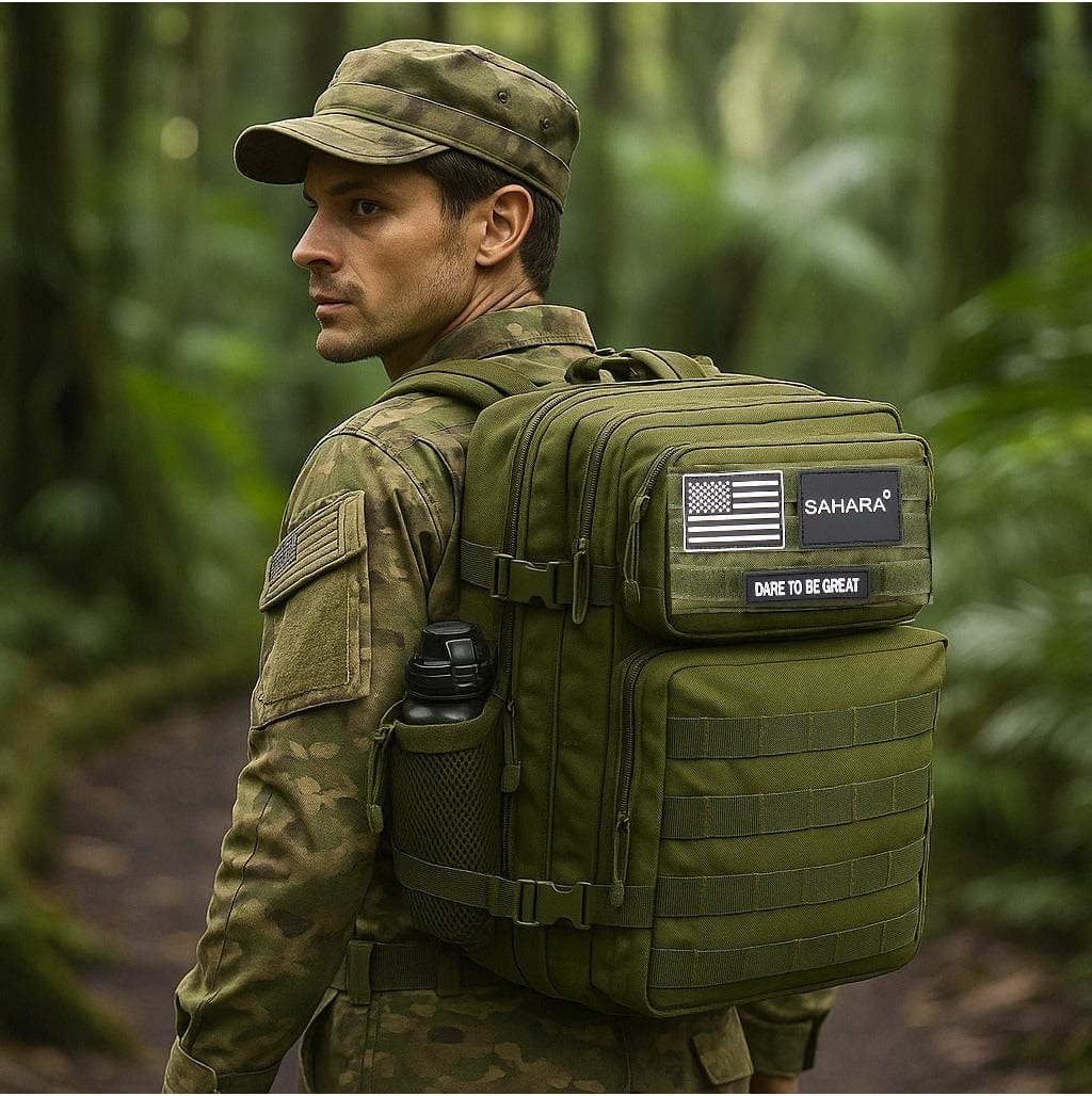 Olive green travel and laptop backpack on person outdoors with front flap pocket
