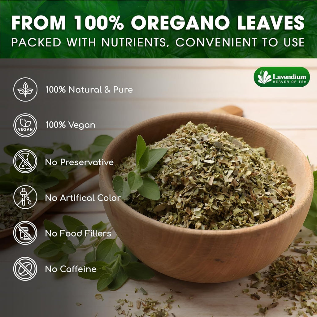Dried oregano leaves in wooden bowl with fresh oregano sprigs nearby
