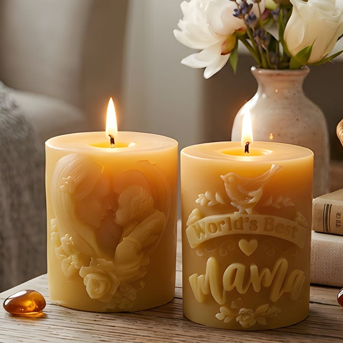 Beeswax candle with embossed floral mother design, lit wick and warm honey color