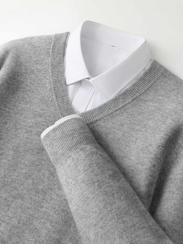 Gray V-neck cashmere sweater neckline with ribbed trim and long sleeves