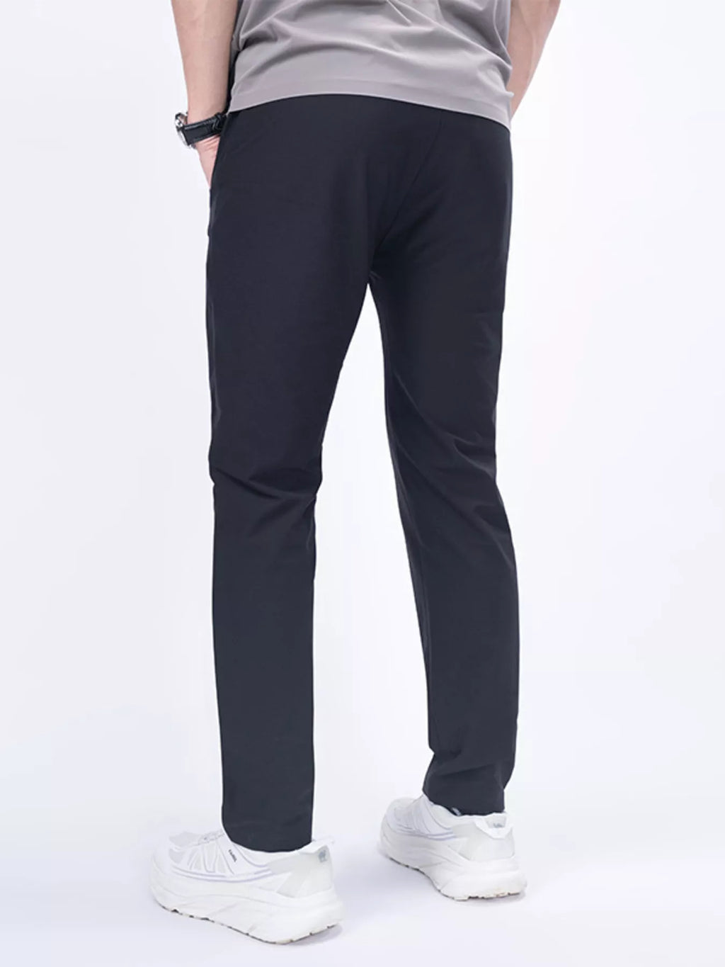 Men's slim-fit casual pants in black, tapered fit with front pockets and belt loops
