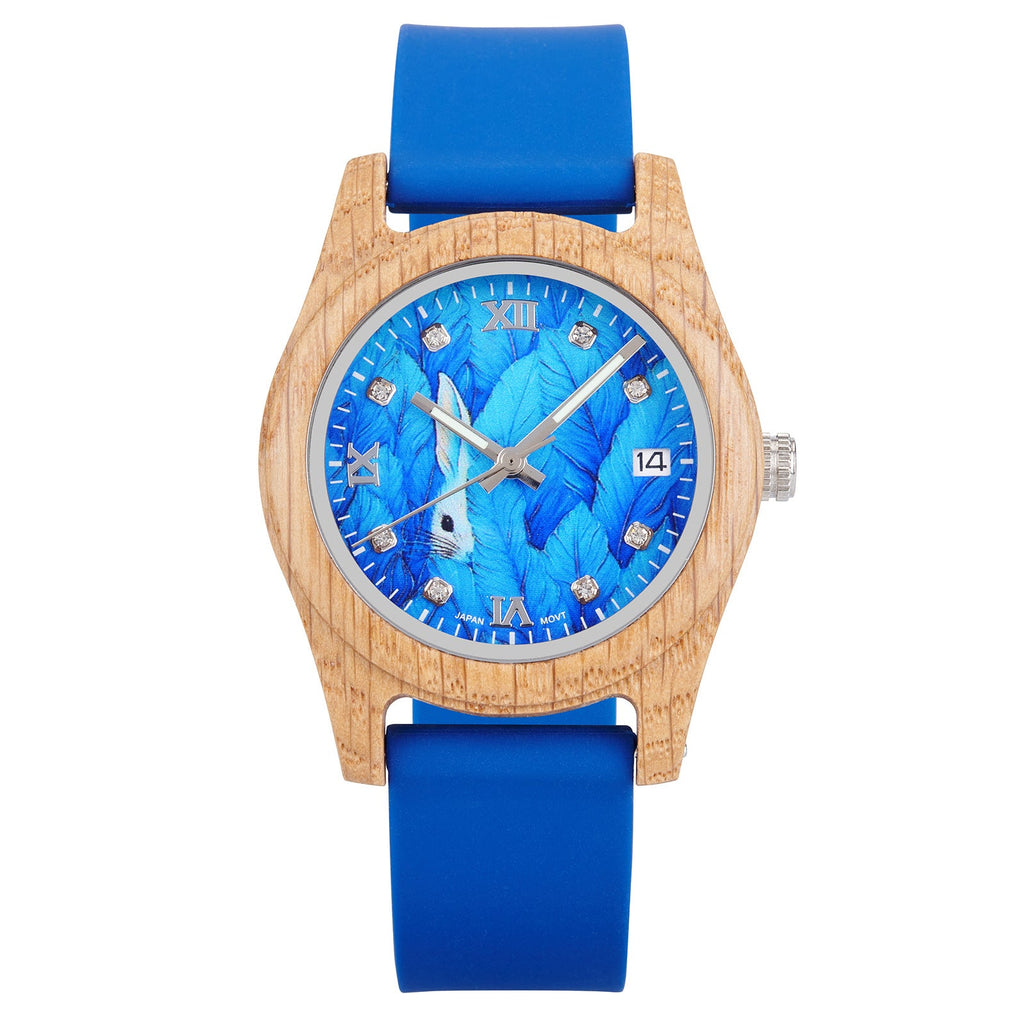 Blue wood wristwatch with rhinestone markers, roman numerals, and blue silicone strap.
