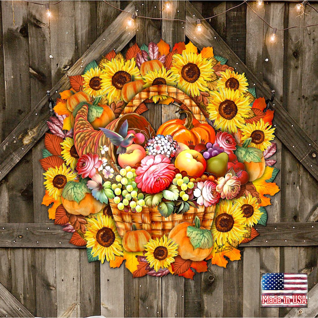 Thanksgiving door wreath with basket center, bright sunflowers, pumpkins, and hanging string lights