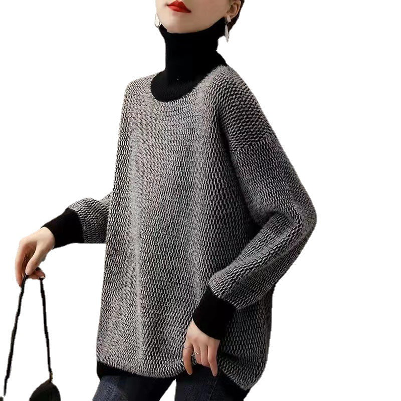 Women’s knit turtleneck sweater in dark charcoal, roomy fit with ribbed cuffs and hem.