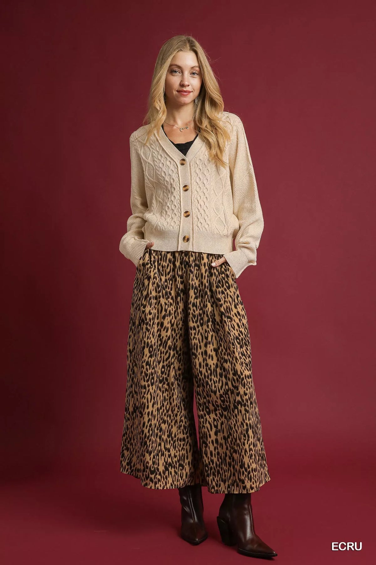Ecru chunky cable knit v-neck button-up cardigan with long sleeves