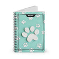 Mint green spiral notebook showing open pages and 3D cat paw cover