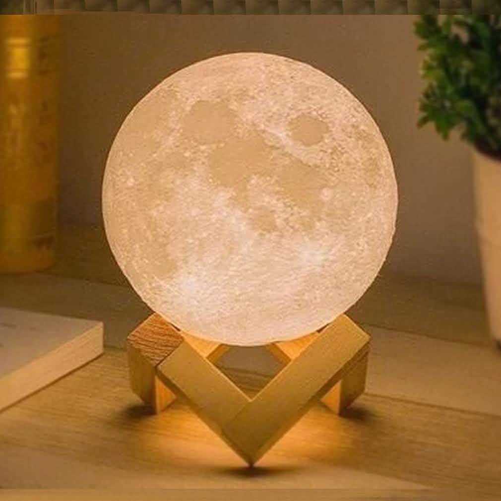 Globe night light with warm beige glow and light wood tripod stand