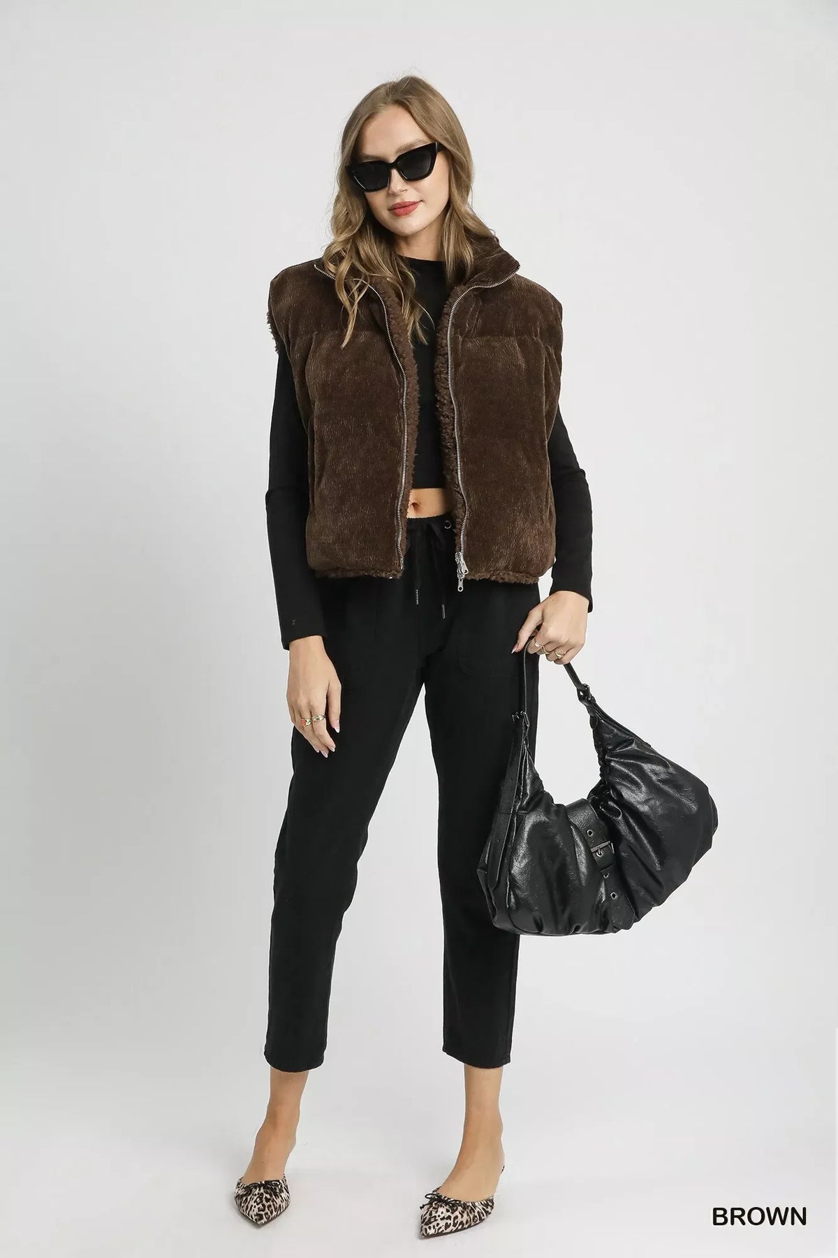 Brown sherpa-lined zip vest with drawstring hem, front full-body view