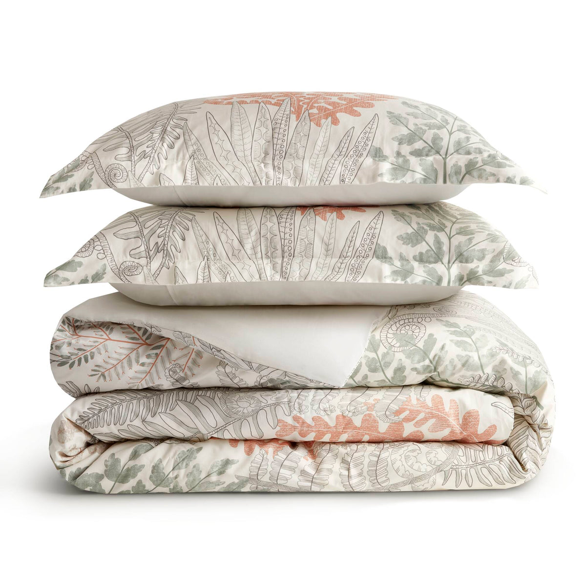 Cotton bedding set folded stack: duvet cover with botanical print, white with terracotta accents
