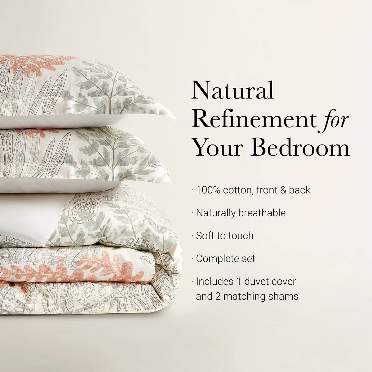 Cotton duvet cover set with botanical print, stacked look; white with terracotta and sage leaves