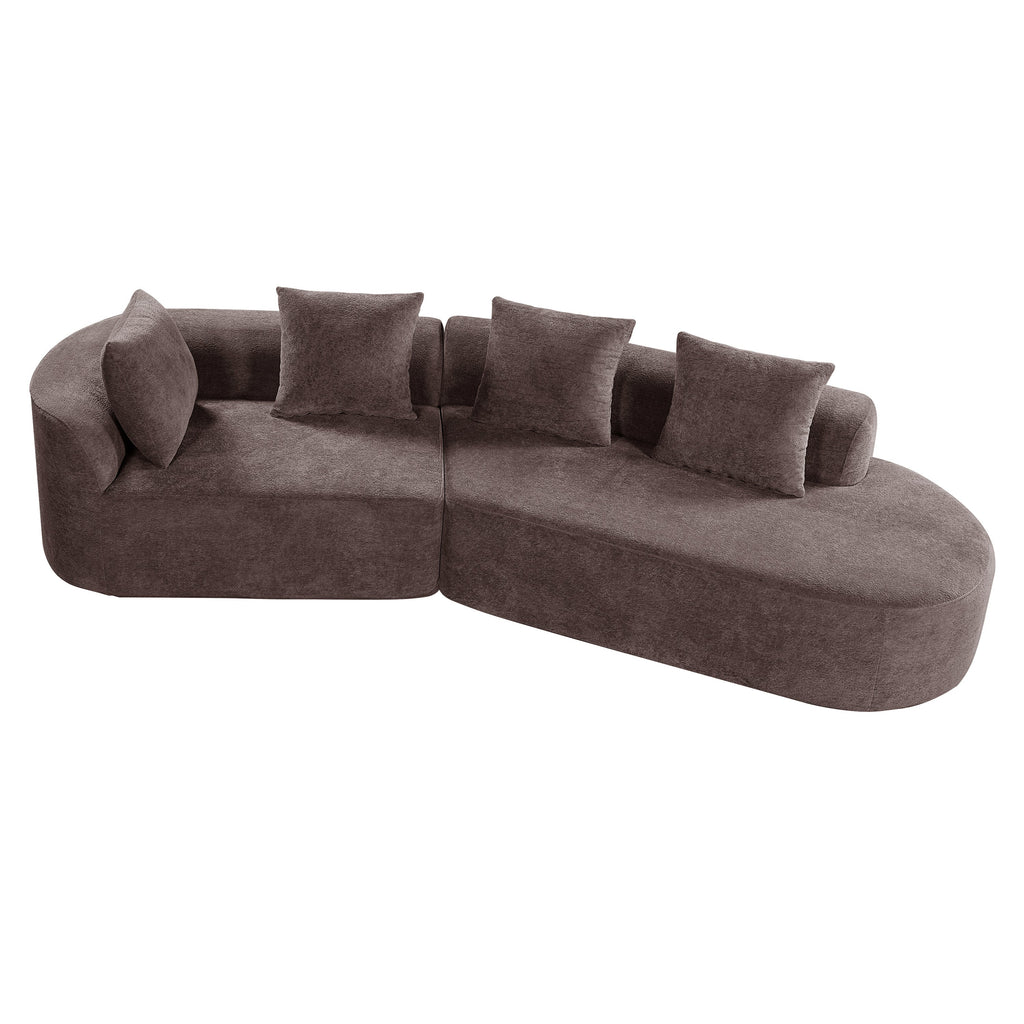 Brown curved sectional sofa with rounded chaise end and five square throw pillows