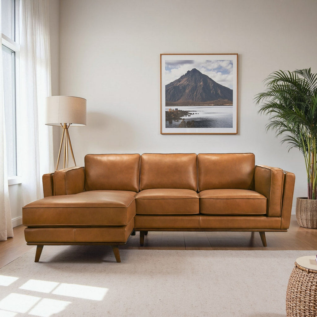 Light brown sectional sofa with chaise corner and three back cushions