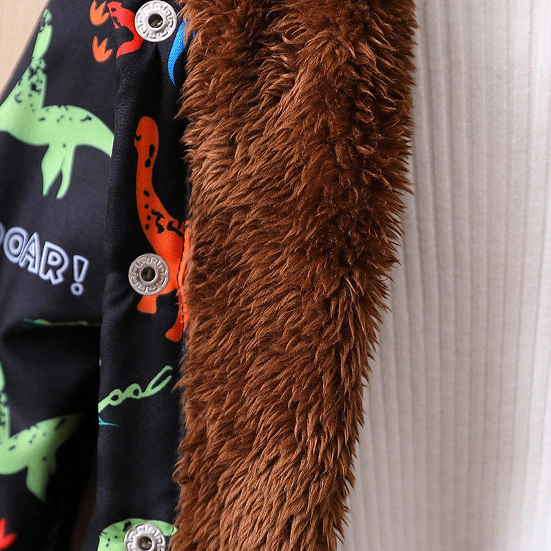 Brown fuzzy fleece lining on the side panel of a black dinosaur hooded coat