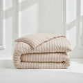 Beige striped sateen duvet cover with matching pillow shams, smooth fabric