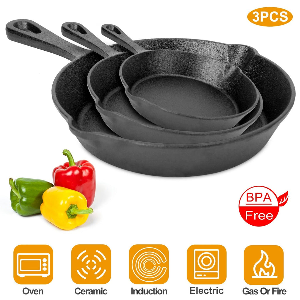 Black cast iron skillet set with three nested frying pans and loop handles