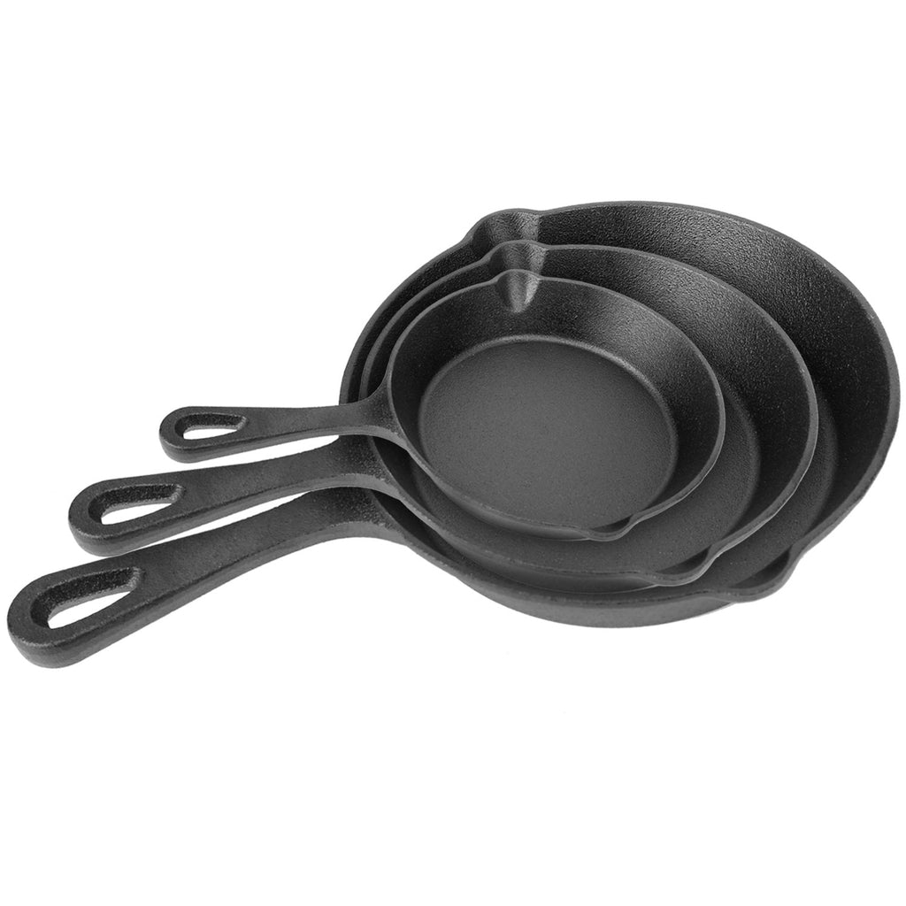 Nested black cast iron skillet set with three pans and loop side handles