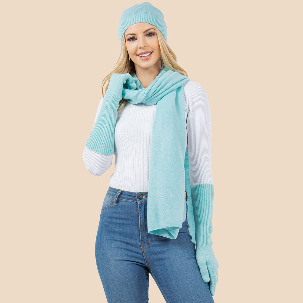 Light blue knit beanie, scarf, and gloves set with matching ribbed cuffs