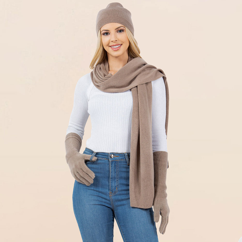 Taupe knit beanie, matching scarf, and gloves set for winter wear
